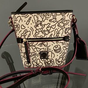 Disney Parks Dooney & Burke crossbody bag with adjustable strap and zip closure